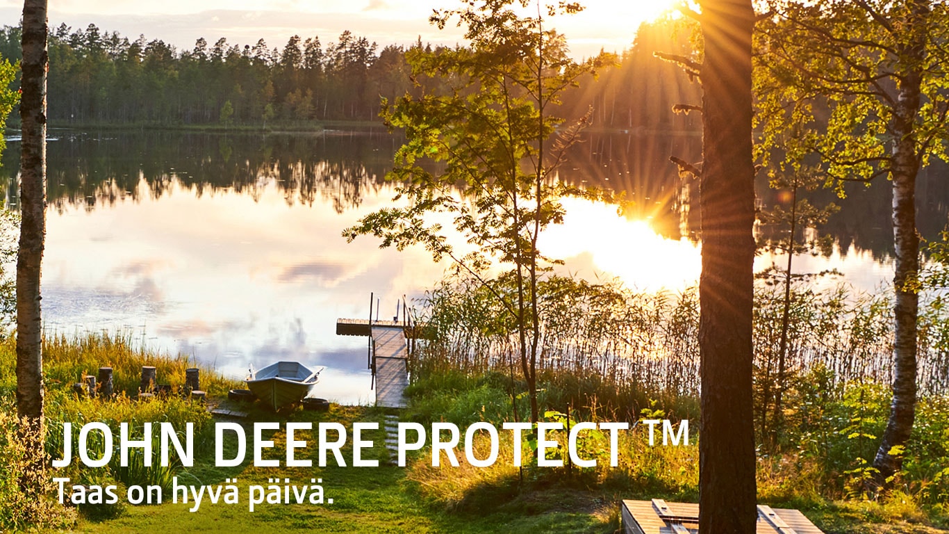 Maantie ja moottoripyörä avarassa maisemassa