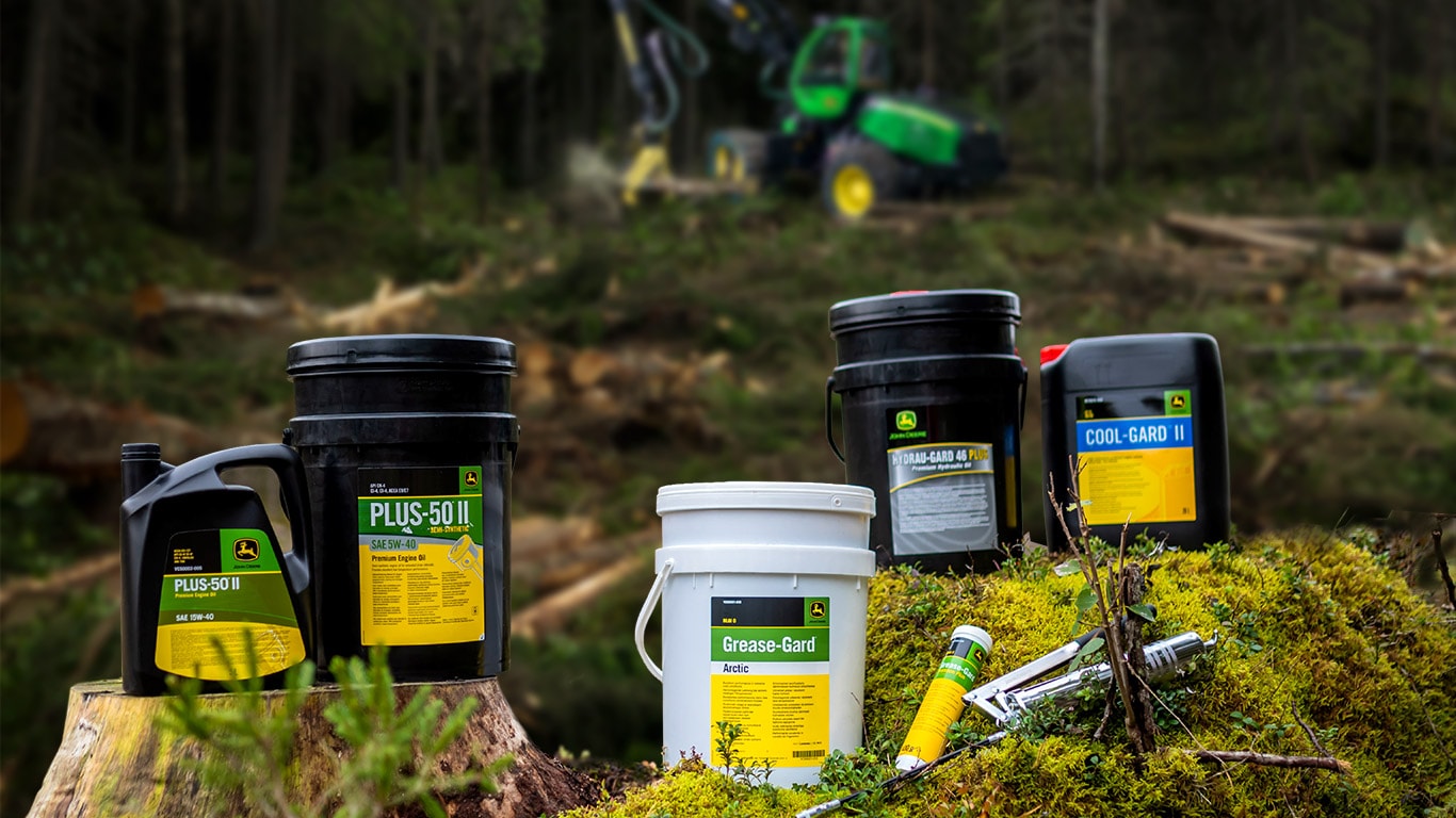 John Deere öljyjä ja voiteluaineita metsässä