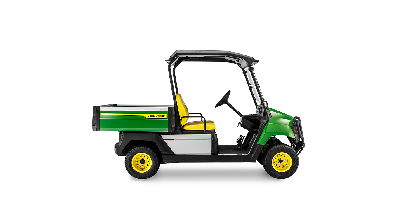 Sivunäkymä bensiinikäyttöisestä John Deere Gator GS -lava-ajoneuvosta, jossa on vihreä runko, keltaiset pyörät ja avoin ohjaamo.