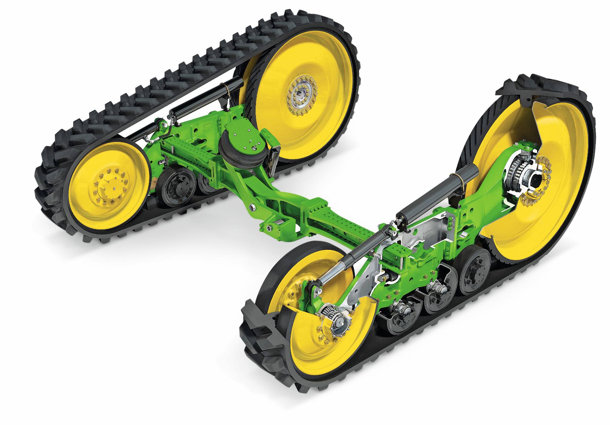 John Deere -traktorien telakokoonpanot, joissa on kumitelat, jousitusvarret ja keltaiset käyttöpyörät, näkymä valkoisella studiotaustalla.